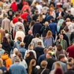 A crowd of people walking
